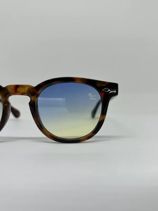 oculos tanned animal print lente azul